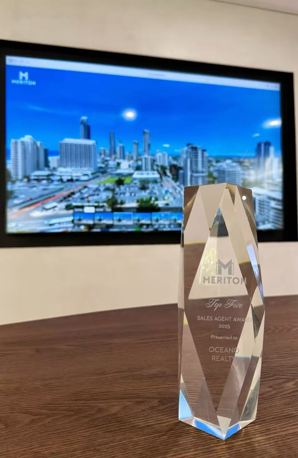 Meriton Top Sales Agent Award 2025 trophy, presented to Oceano Realty